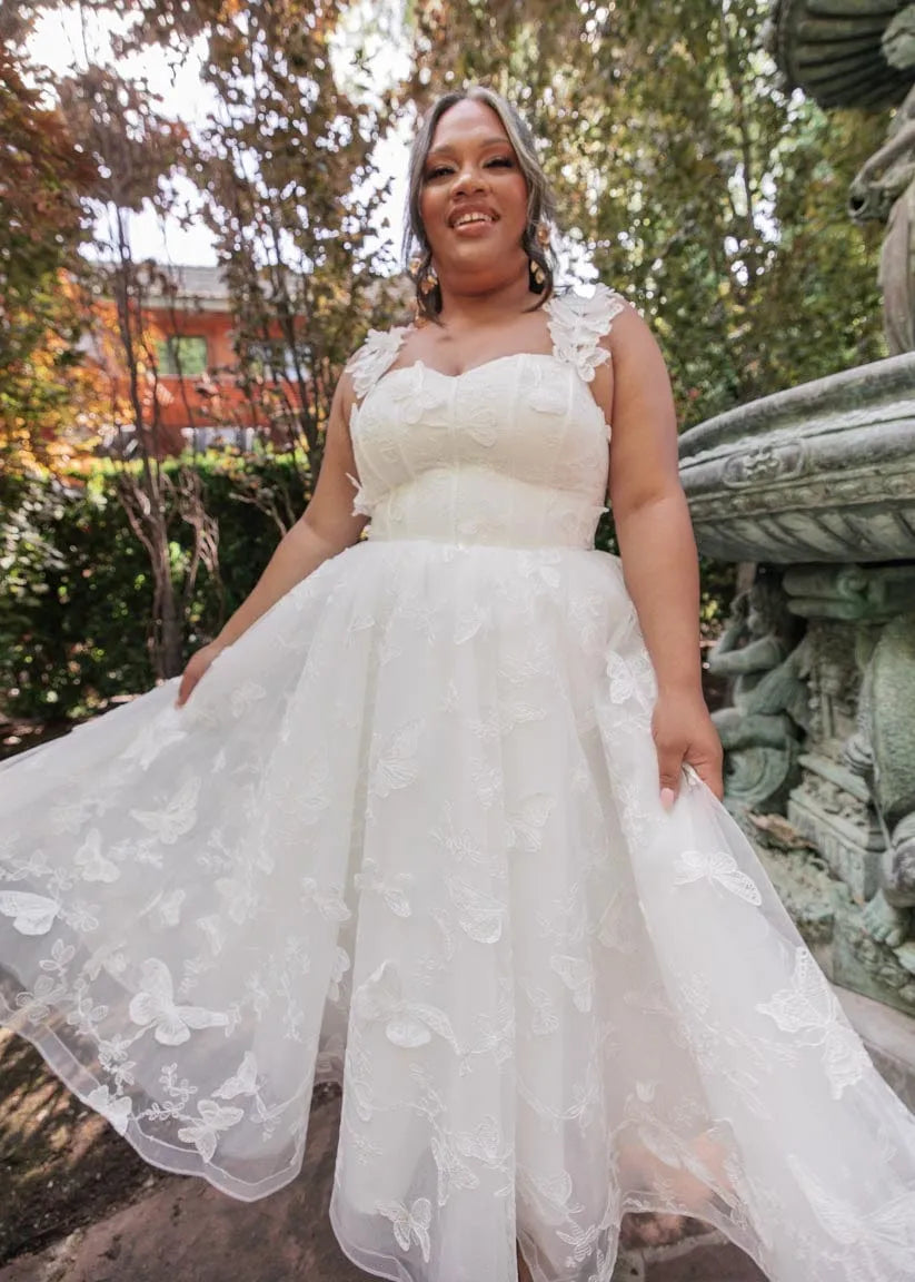 mariposa floral lace bodice dress Have you fallen in love with MARIPOSA yet? An enchanting, lustrous lace showstopper adorned with shimmering details & bold geometric sheer cutouts. Mariposa is the perfect balance of sparkle & structure