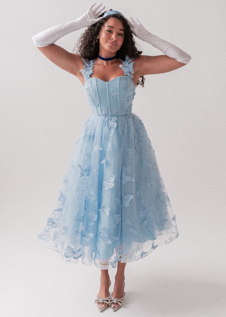 chic size inclusive model wearing JessaKae Mariposa Dress Dresses