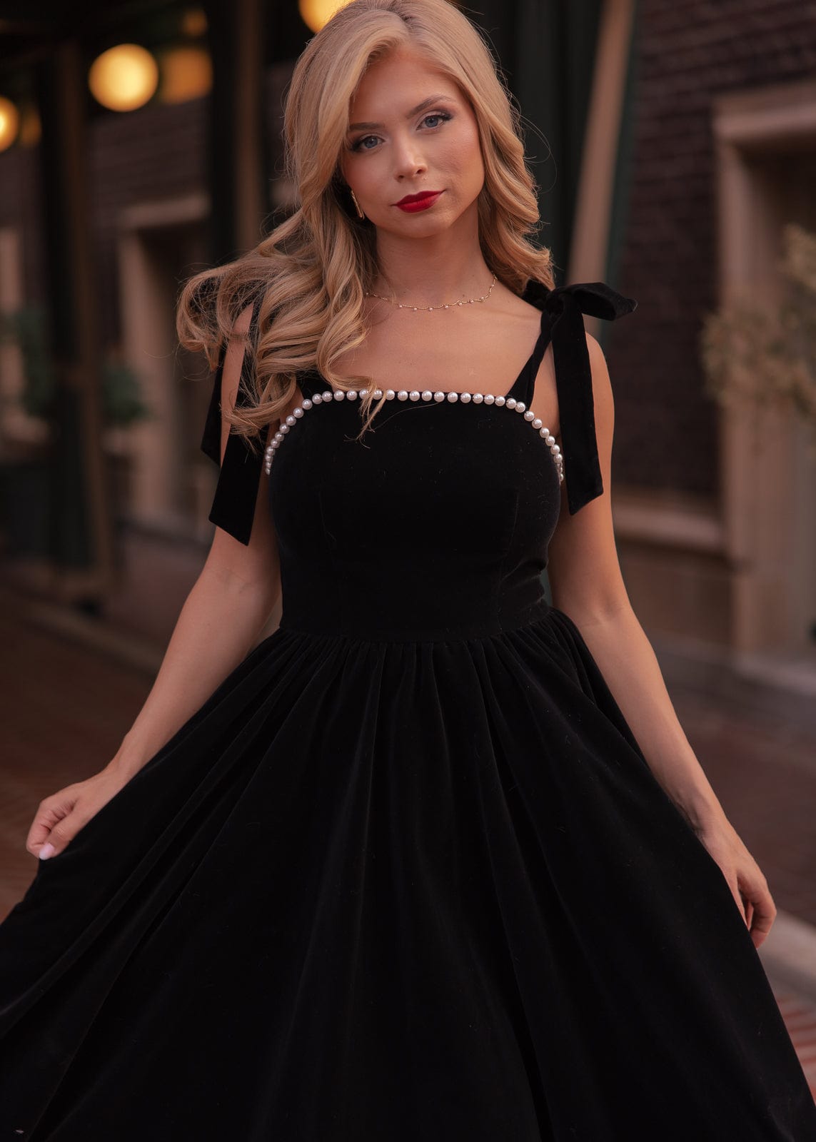 chic size inclusive model wearing JessaKae Mary Dress