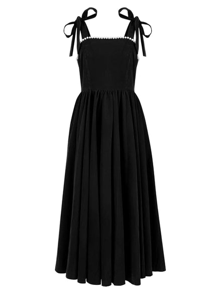 chic size inclusive model wearing JessaKae Mary Velvet Holiday Pearl Dress - Black Dresses