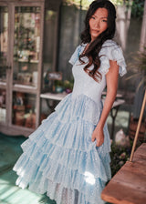 chic size inclusive model wearing JessaKae Mia Dress - Pink + Blue Dresses
