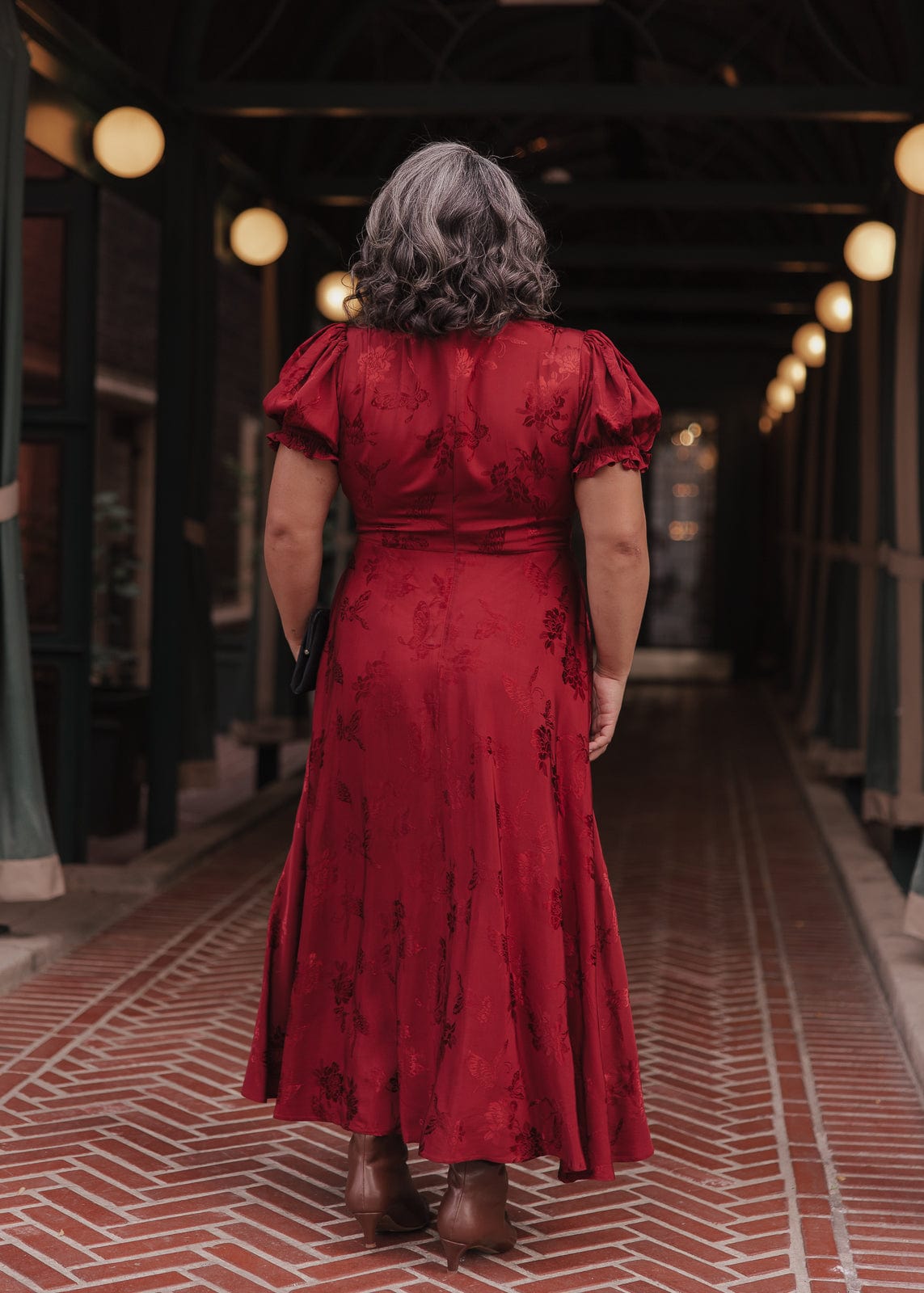 chic size inclusive model wearing JessaKae Mila Dress