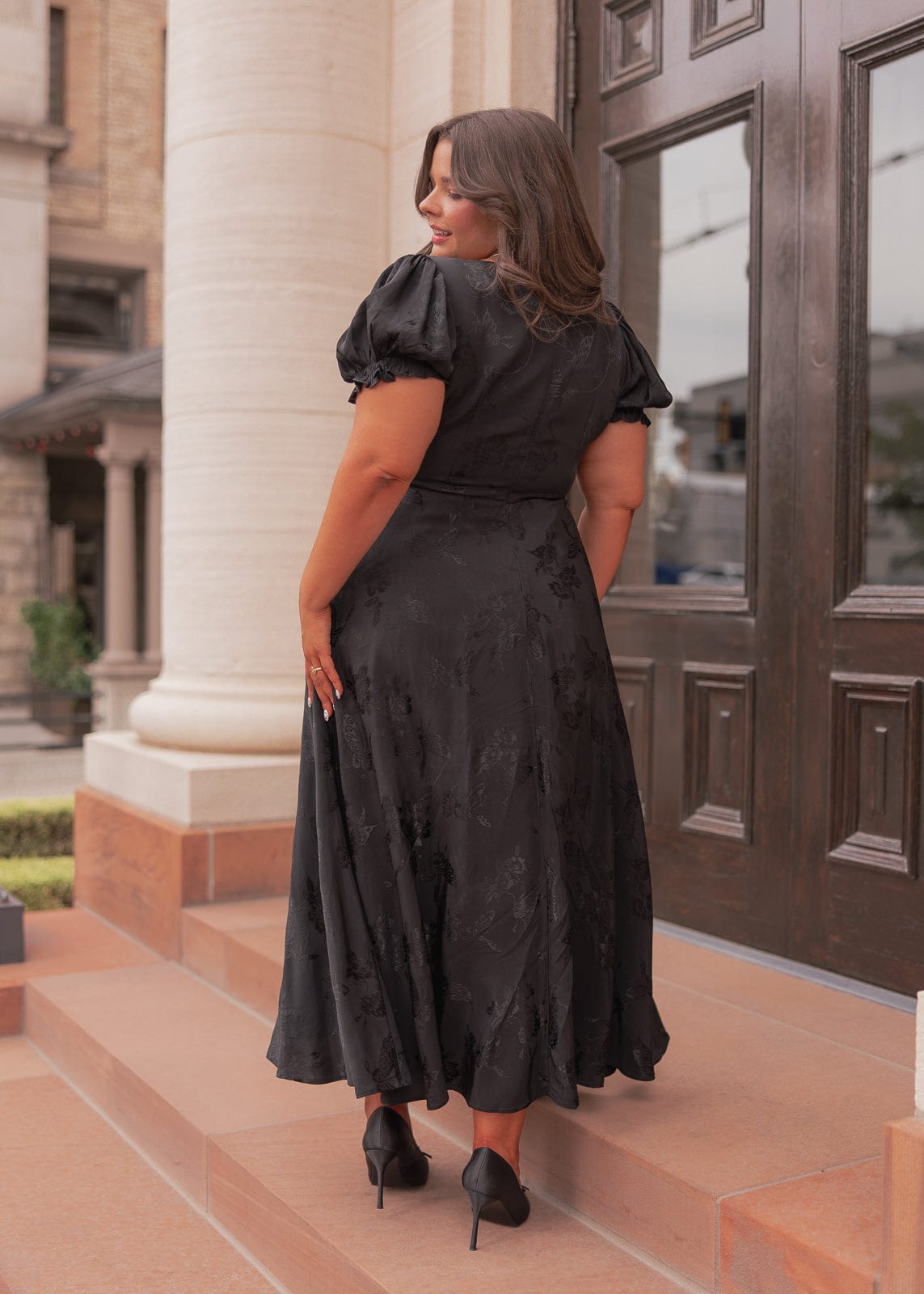 chic size inclusive model wearing JessaKae Mila Dress