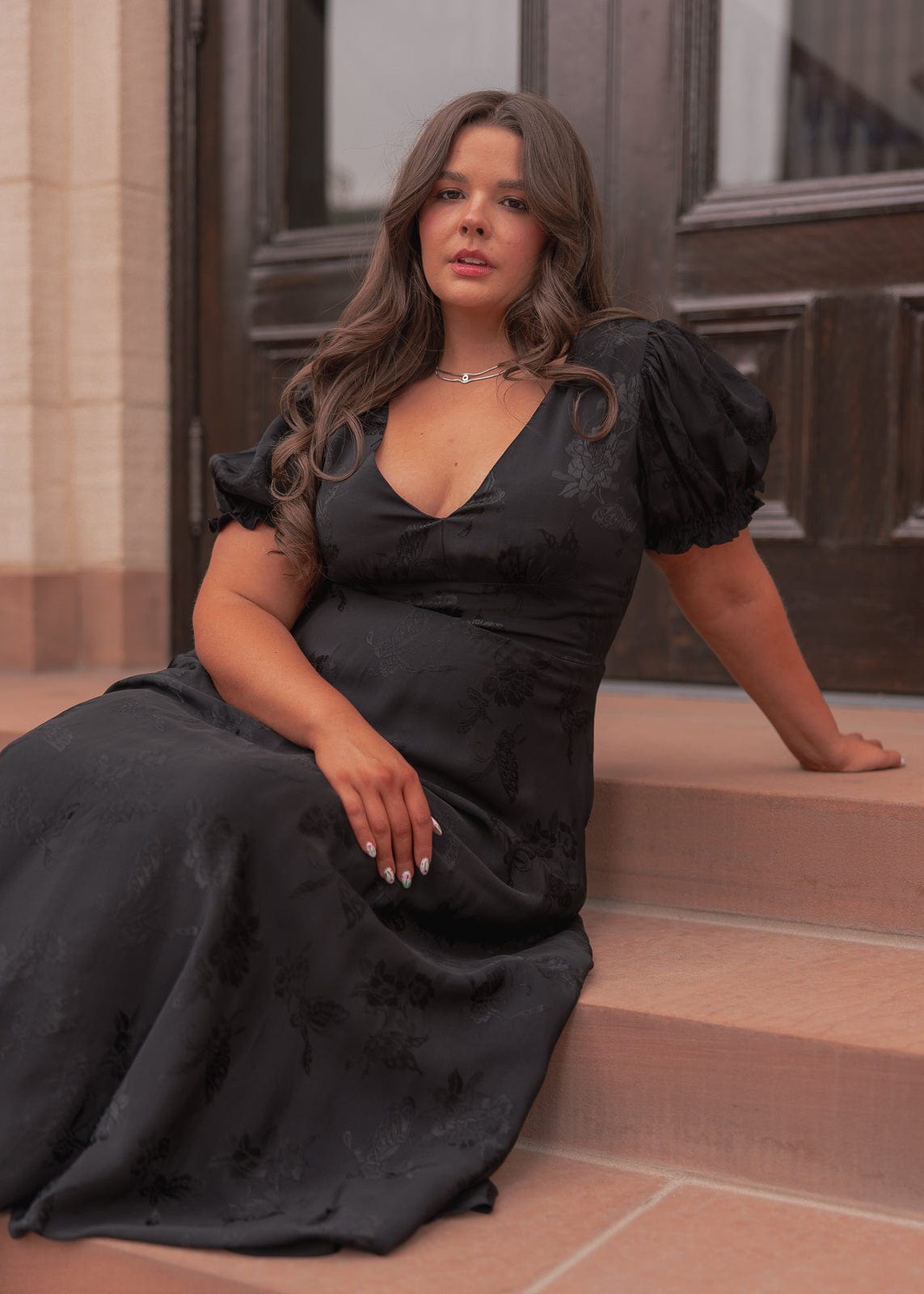 chic size inclusive model wearing JessaKae Mila Dress