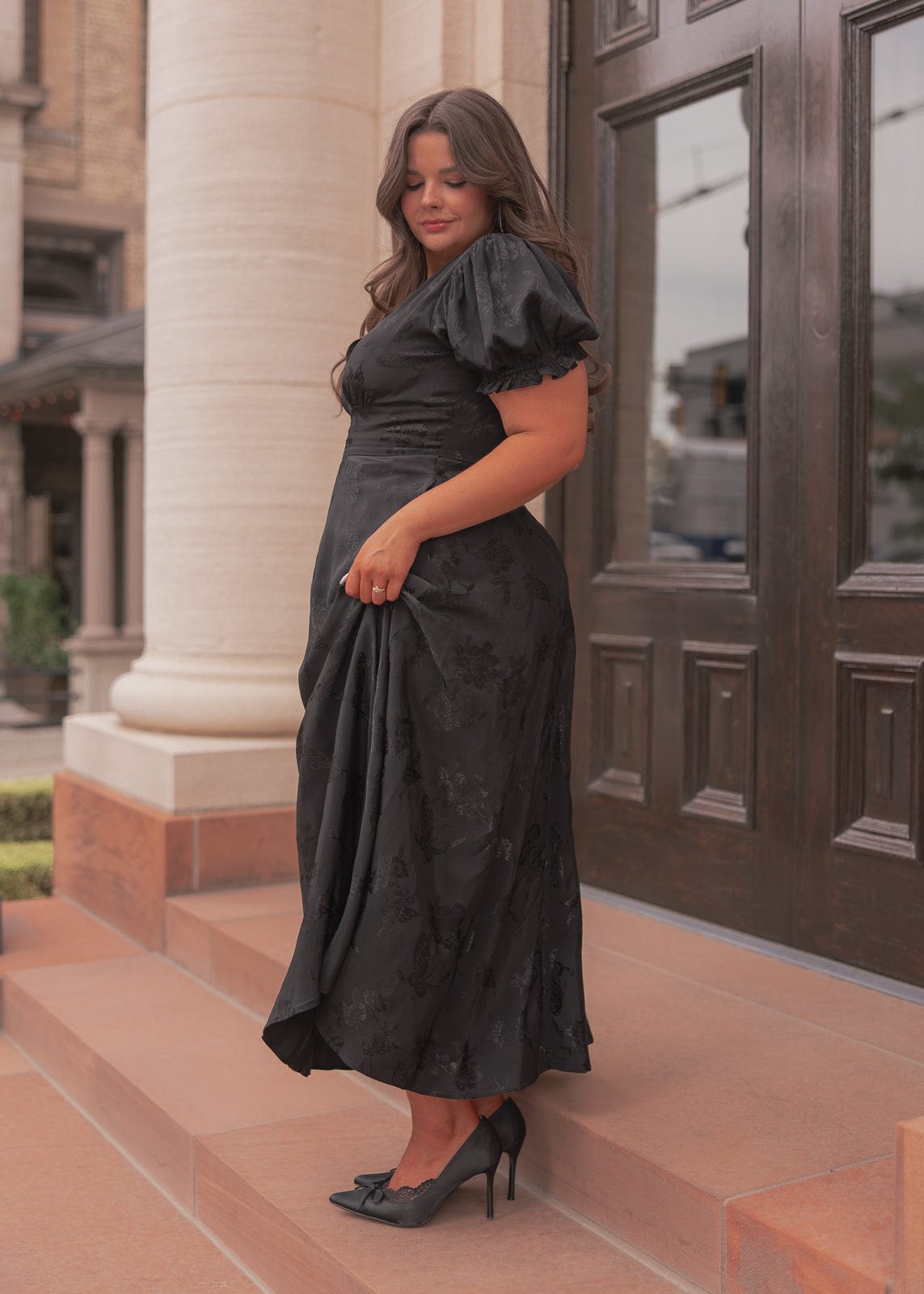 chic size inclusive model wearing JessaKae Mila Dress