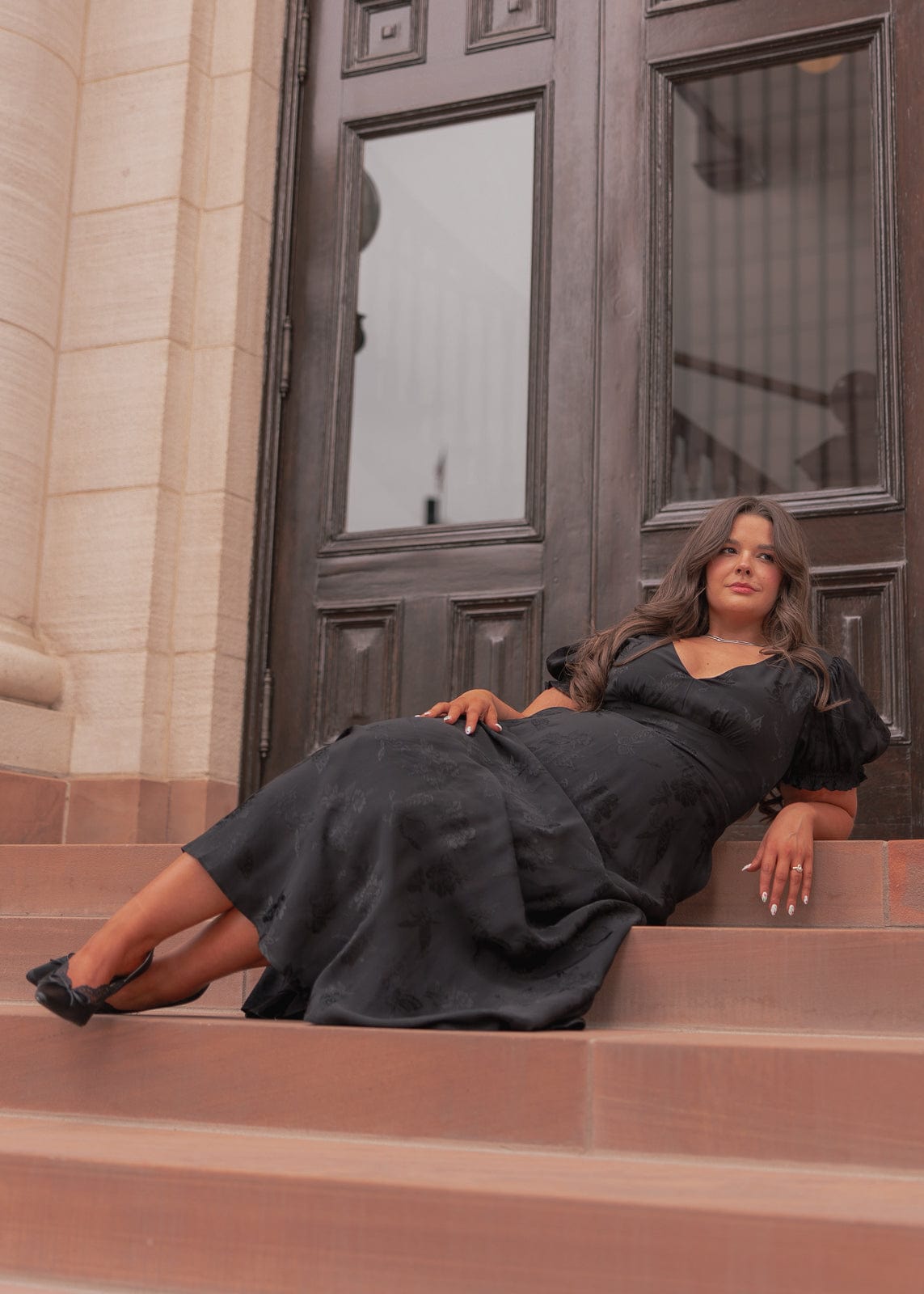 chic size inclusive model wearing JessaKae Mila Dress