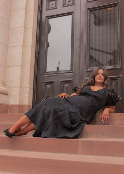 chic size inclusive model wearing JessaKae Mila Dress