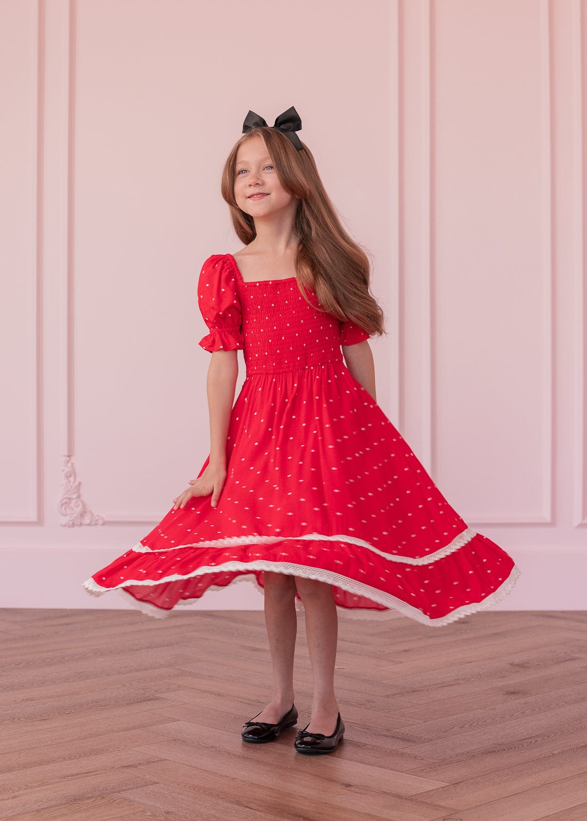 chic size inclusive model wearing JessaKae Minnie Girls Dress