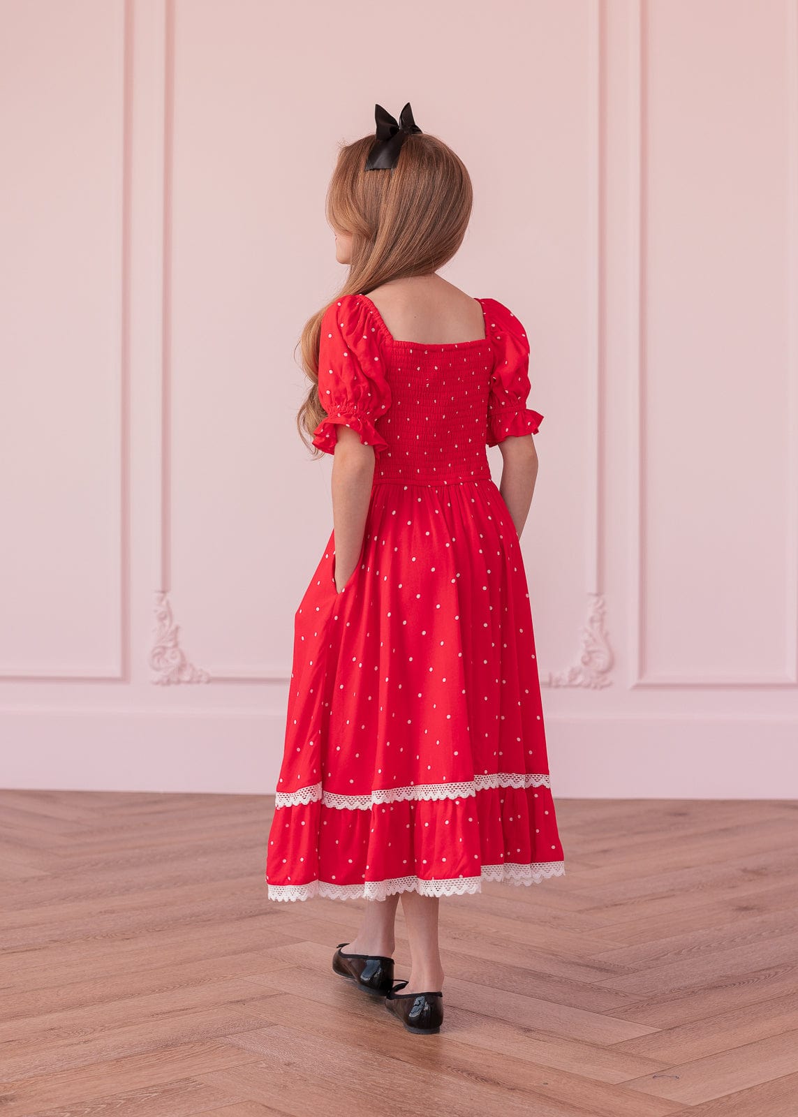 chic size inclusive model wearing JessaKae Minnie Girls Dress