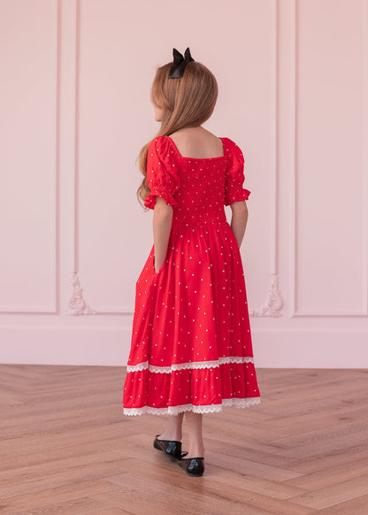 chic size inclusive model wearing JessaKae Minnie Girls Dress