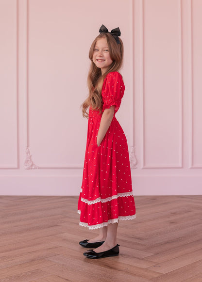 chic size inclusive model wearing JessaKae Minnie Girls Dress