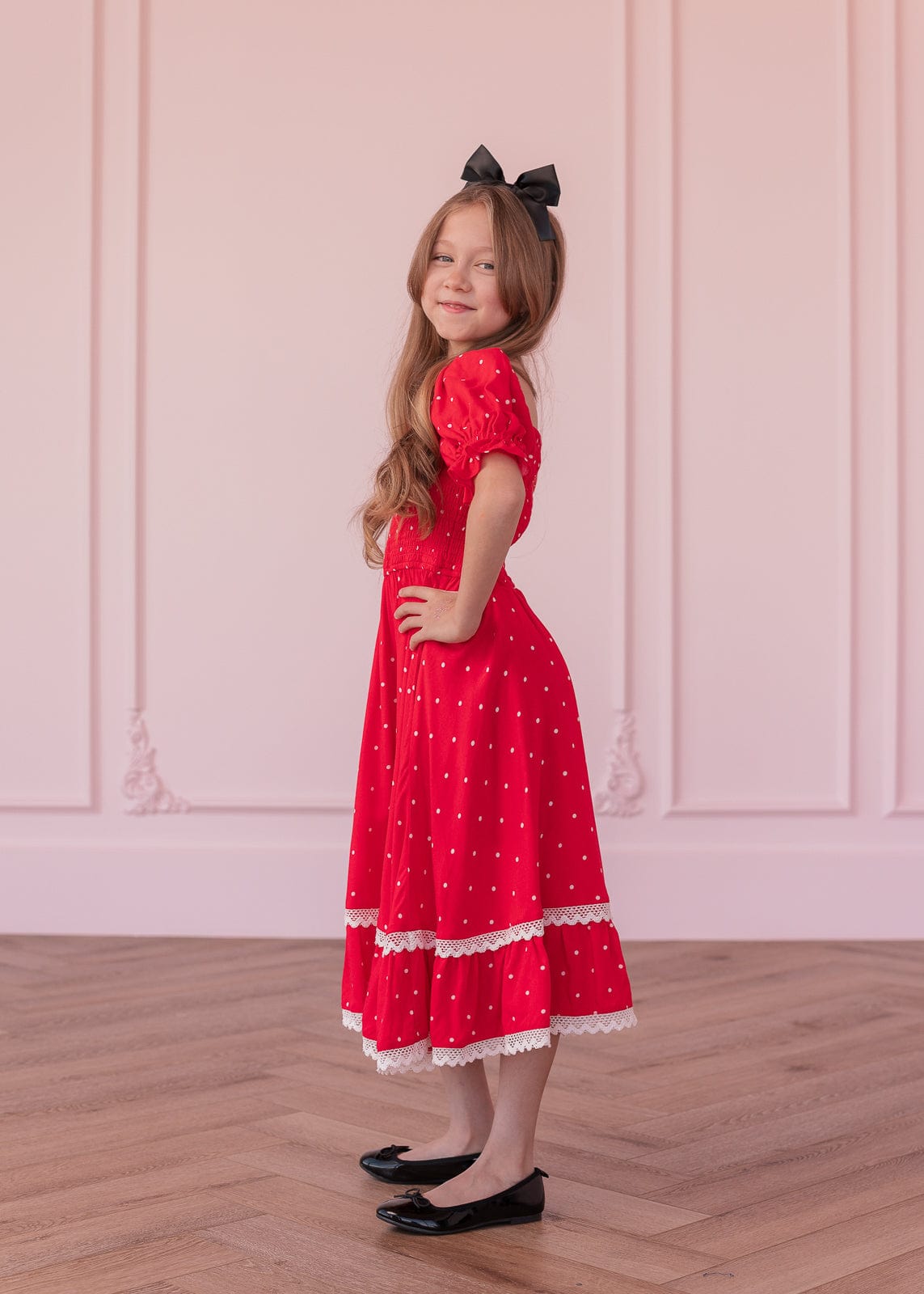 chic size inclusive model wearing JessaKae Minnie Girls Dress