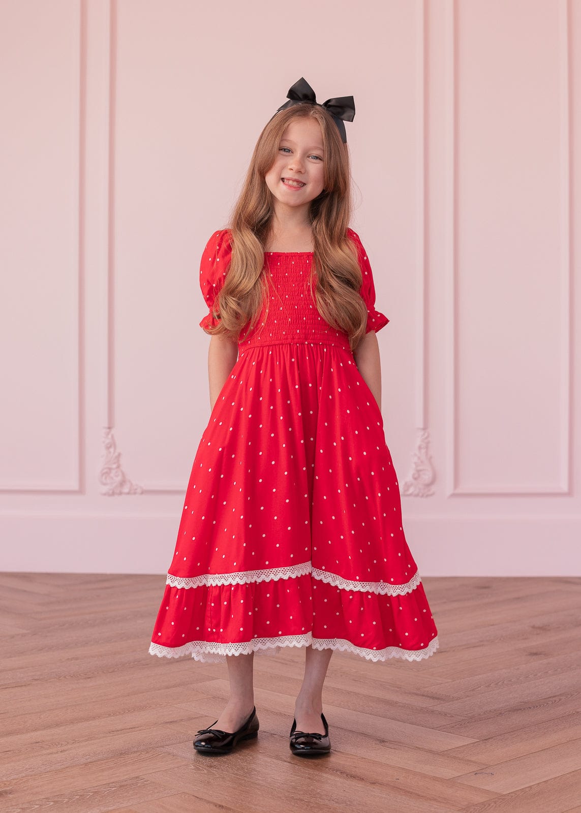 chic size inclusive model wearing JessaKae Minnie Girls Dress