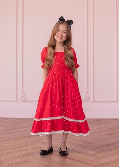 chic size inclusive model wearing JessaKae Minnie Girls Dress