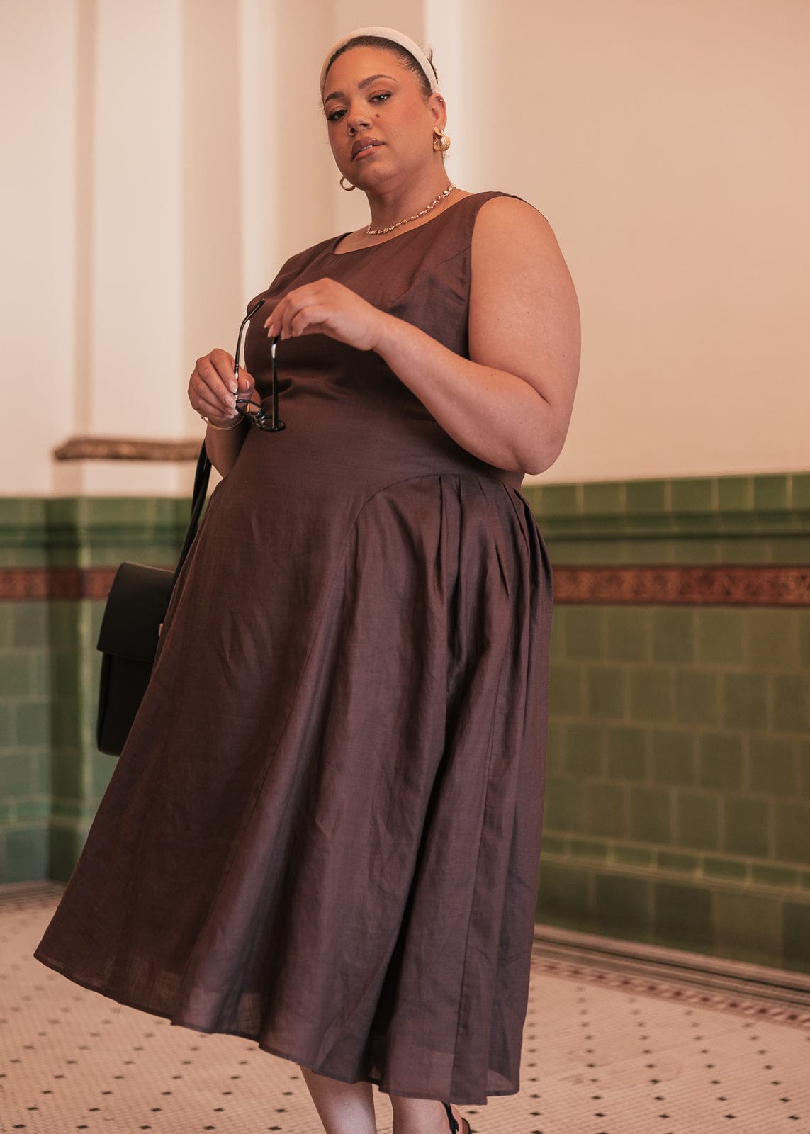 chic size inclusive model wearing JessaKae Miranda Dress