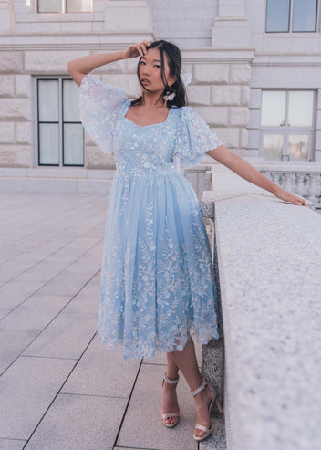 chic size inclusive model wearing JessaKae Misty Dress_Misty Blue / XS Dresses