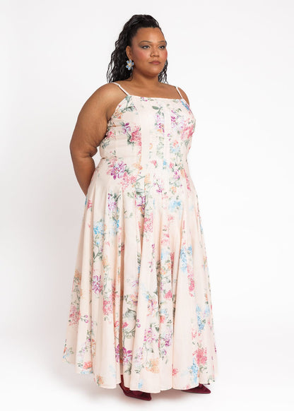 chic size inclusive model wearing JessaKae Monet Floral Seamed Maxi Dress