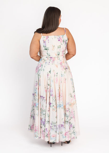 chic size inclusive model wearing JessaKae Monet Floral Seamed Maxi Dress