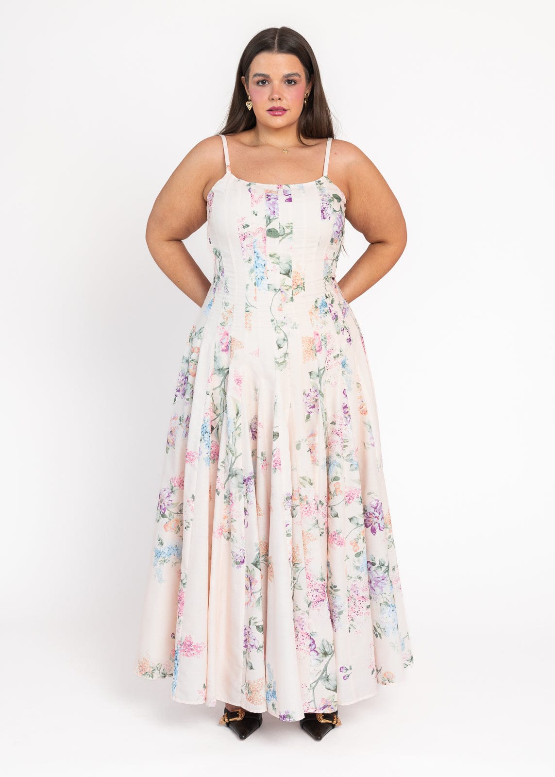 chic size inclusive model wearing JessaKae Monet Floral Seamed Maxi Dress