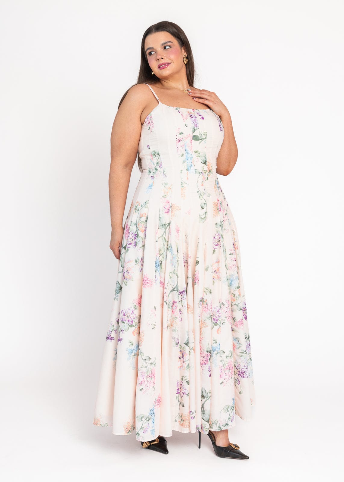 chic size inclusive model wearing JessaKae Monet Floral Seamed Maxi Dress