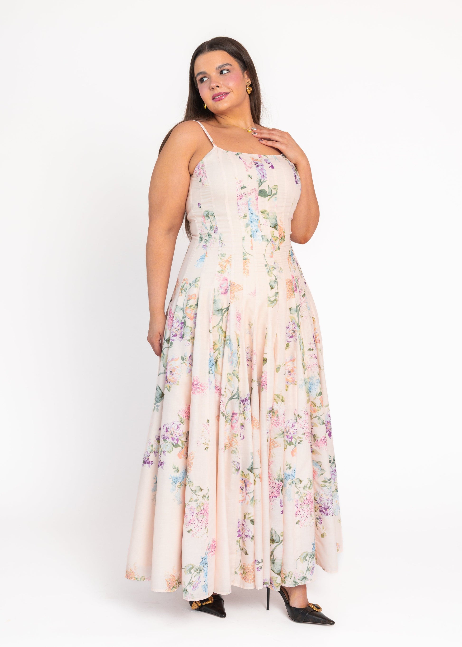 chic size inclusive model wearing JessaKae Monet Floral Seamed Maxi Dress