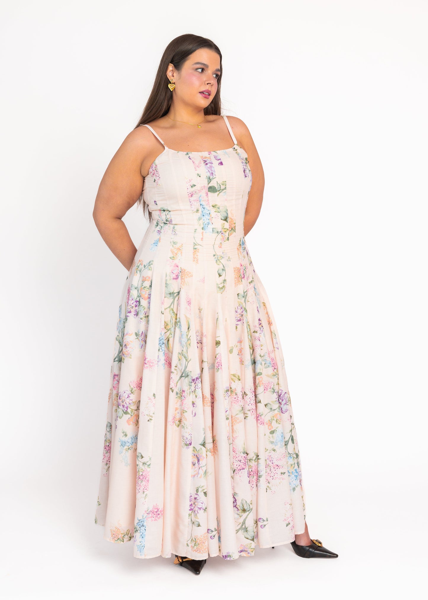 chic size inclusive model wearing JessaKae Monet Floral Seamed Maxi Dress