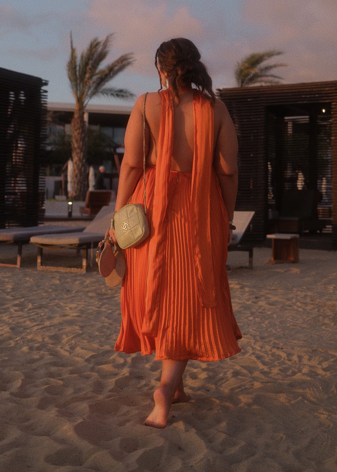 chic size inclusive model wearing JessaKae Nalania Dress