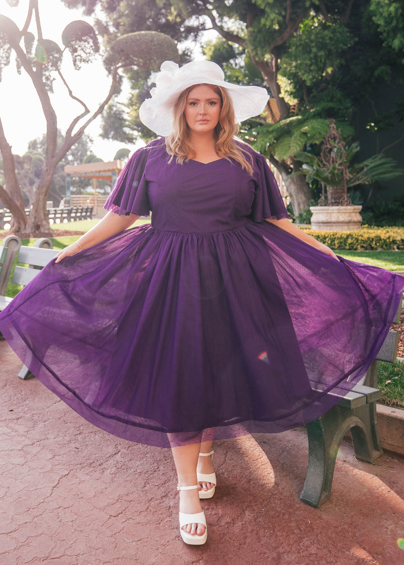 chic size inclusive model wearing JessaKae Nora Dress Purple / XXS Dresses