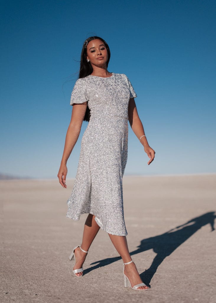 chic size inclusive model wearing JessaKae Nova Dress Dresses