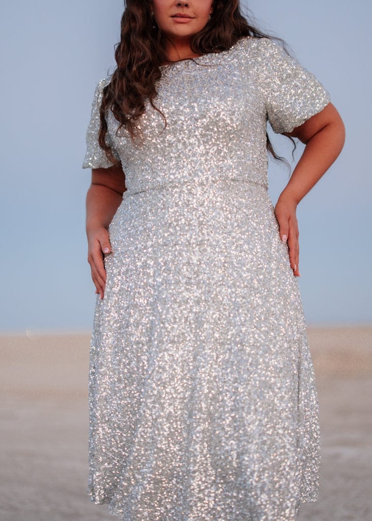 chic size inclusive model wearing JessaKae Nova Dress Dresses