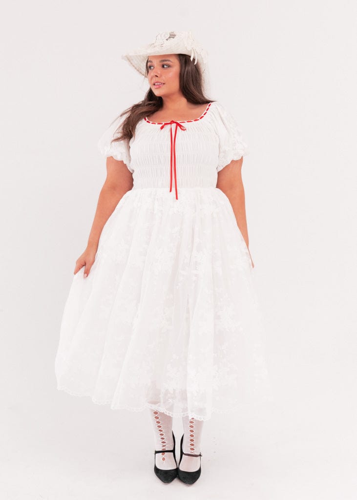 chic size inclusive model wearing JessaKae Poppins Dress Dresses