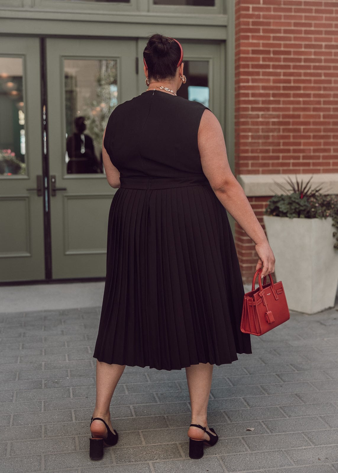 chic size inclusive model wearing JessaKae Presley Dress