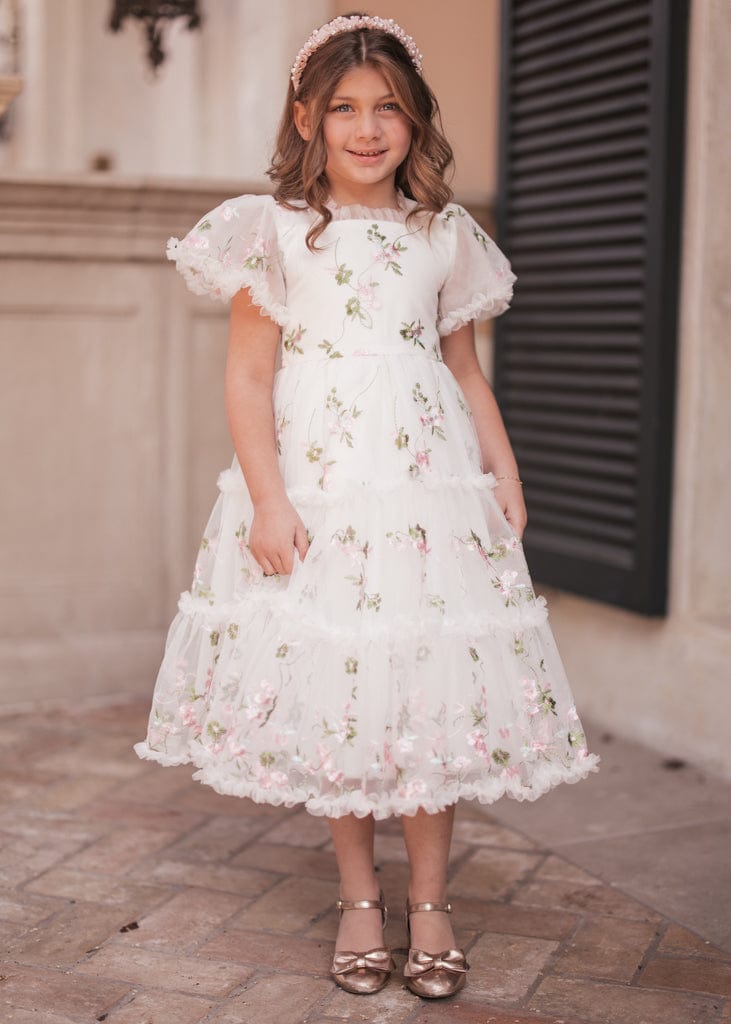 chic size inclusive model wearing JessaKae Promise Girls Dress