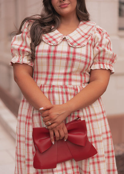 chic size inclusive model wearing JessaKae Pyper Dress