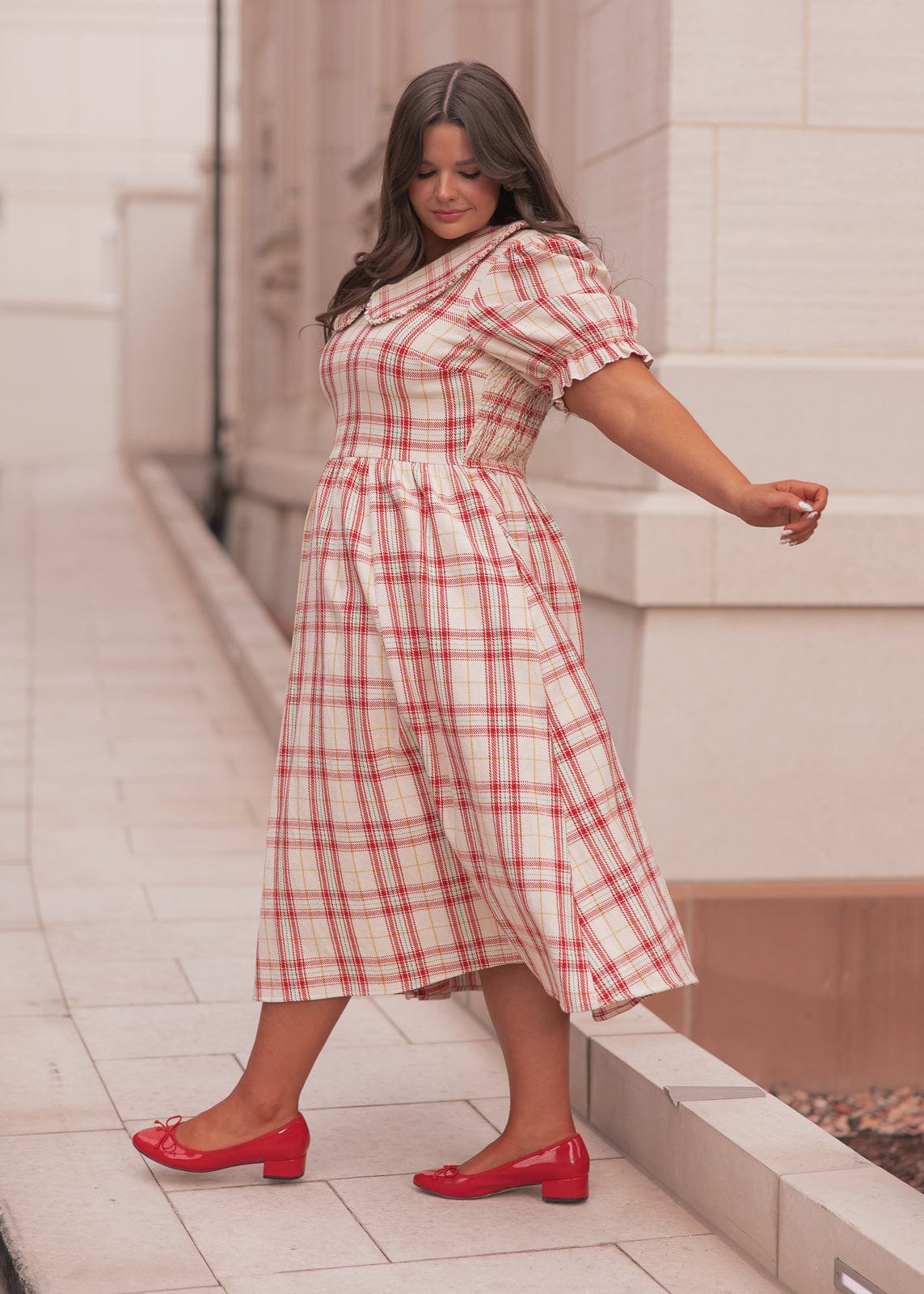 chic size inclusive model wearing JessaKae Pyper Dress