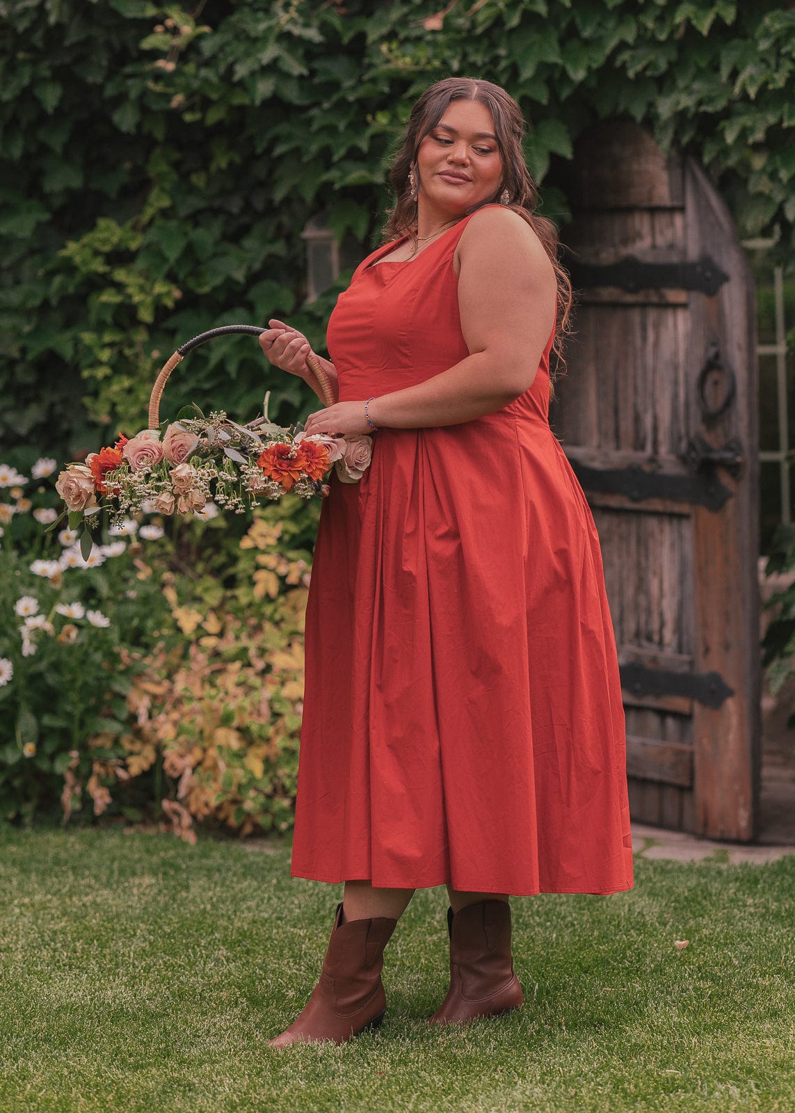 chic size inclusive model wearing JessaKae Quinn Dress