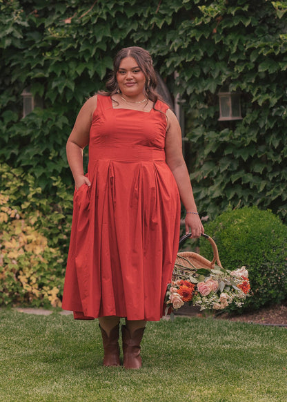 chic size inclusive model wearing JessaKae Quinn Dress