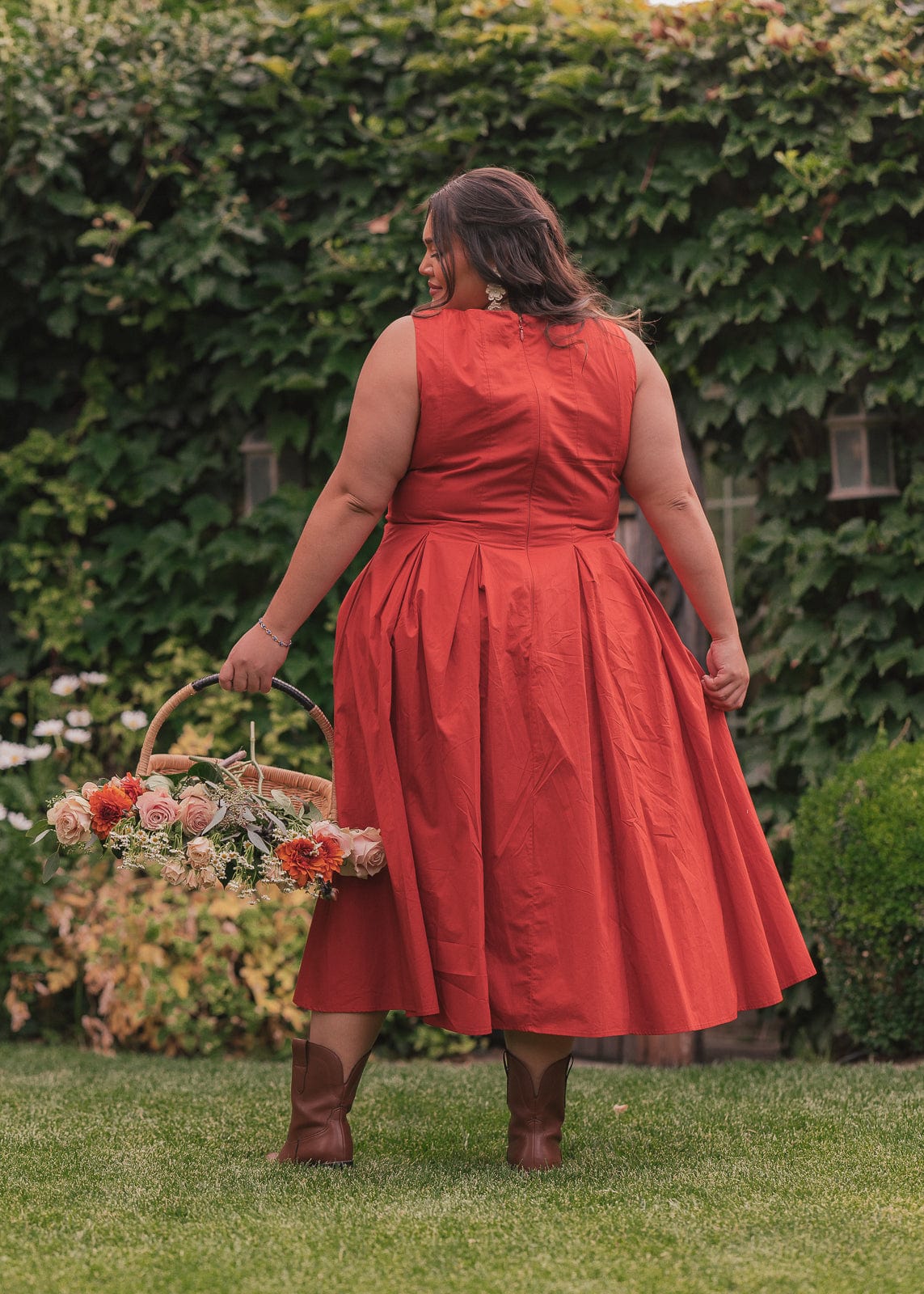 chic size inclusive model wearing JessaKae Quinn Dress