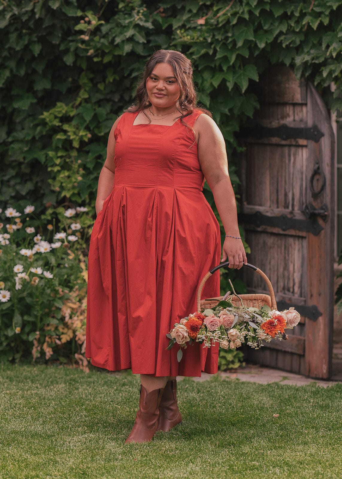 chic size inclusive model wearing JessaKae Quinn Dress