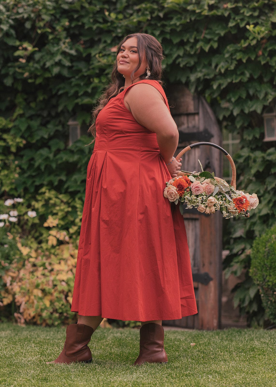 chic size inclusive model wearing JessaKae Quinn Dress