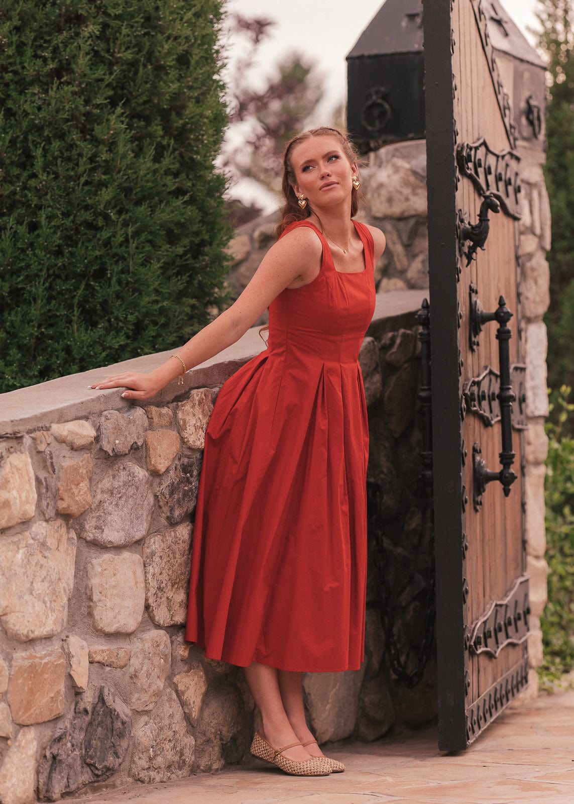 chic size inclusive model wearing JessaKae Quinn Dress