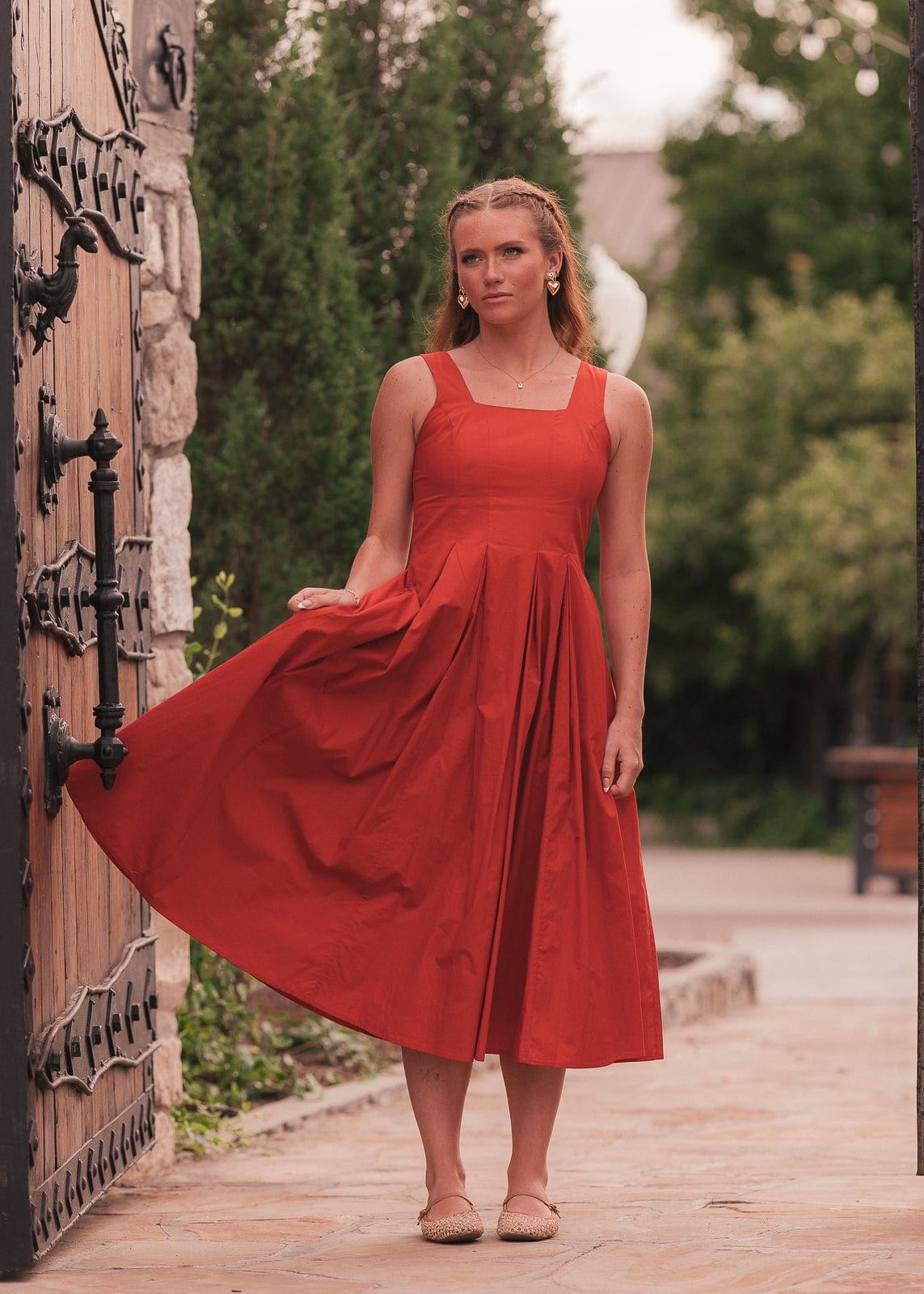 chic size inclusive model wearing JessaKae Quinn Dress