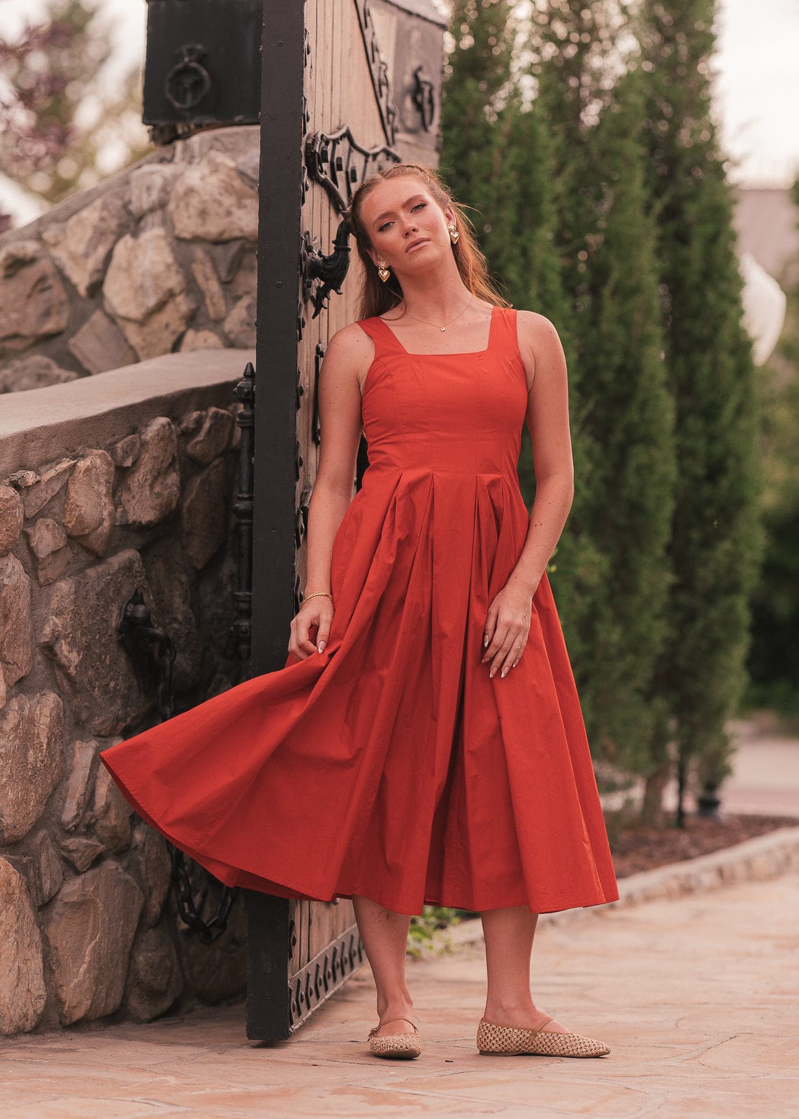 chic size inclusive model wearing JessaKae Quinn Dress