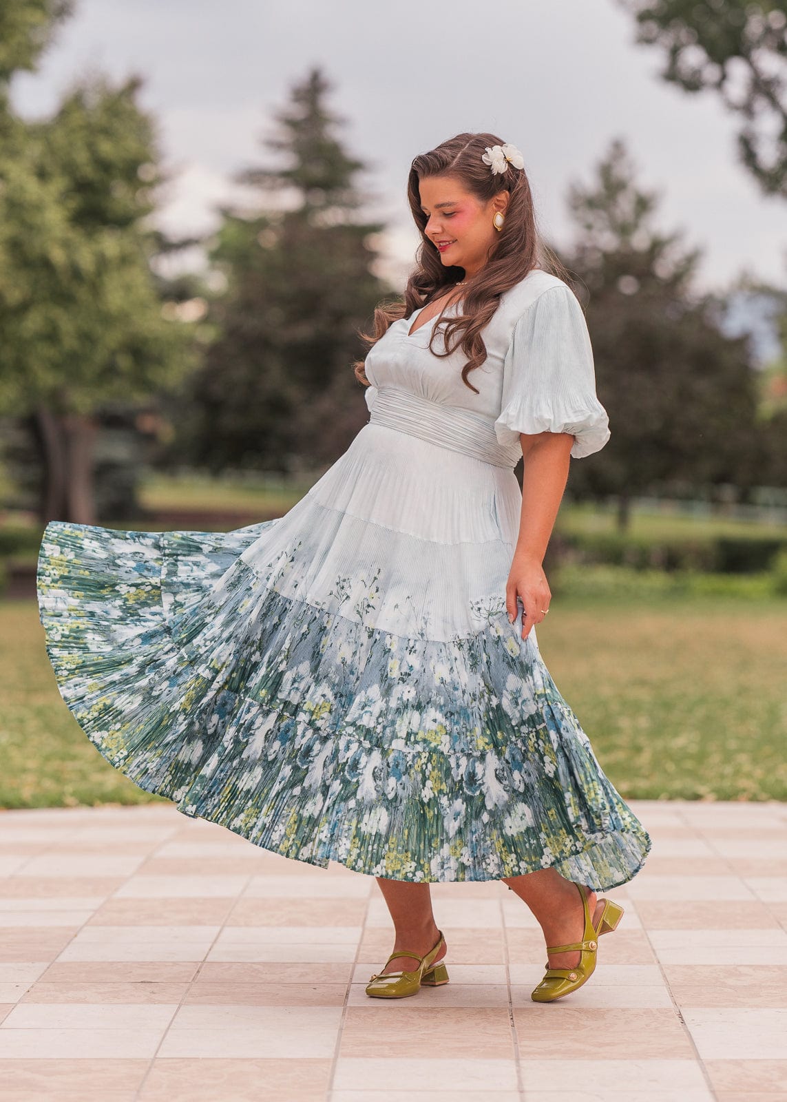 chic size inclusive model wearing JessaKae Renoir Dress