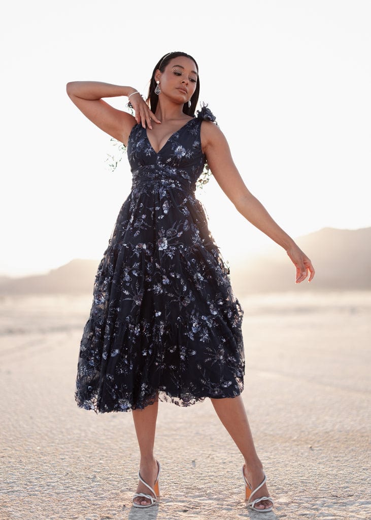 chic size inclusive model wearing JessaKae Rhea Dress Dresses