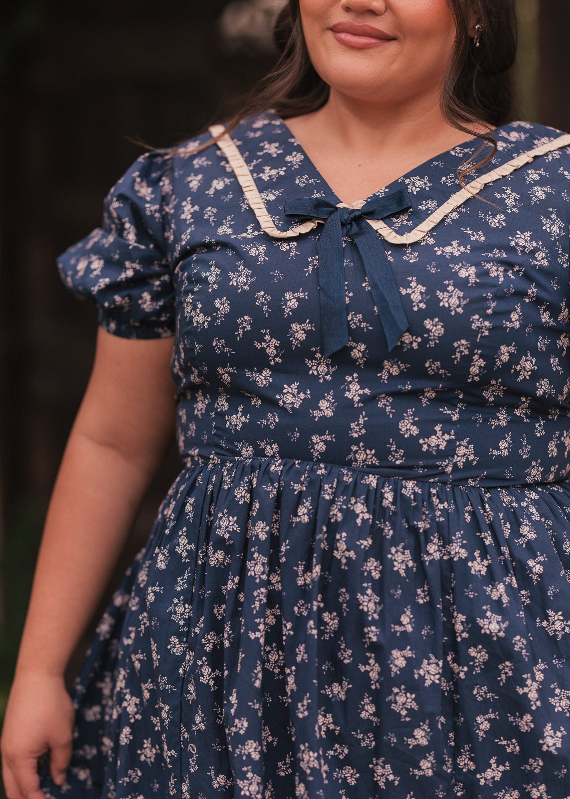 chic size inclusive model wearing JessaKae Rory Dress