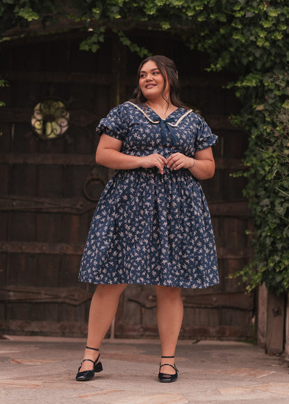 chic size inclusive model wearing JessaKae Rory Dress