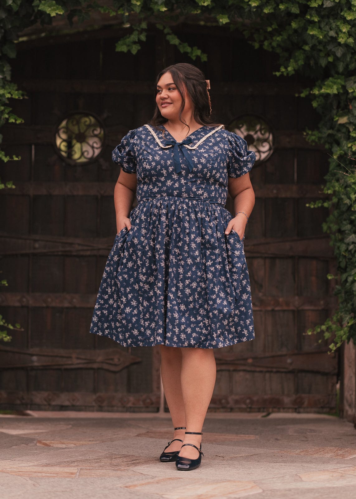 chic size inclusive model wearing JessaKae Rory Dress