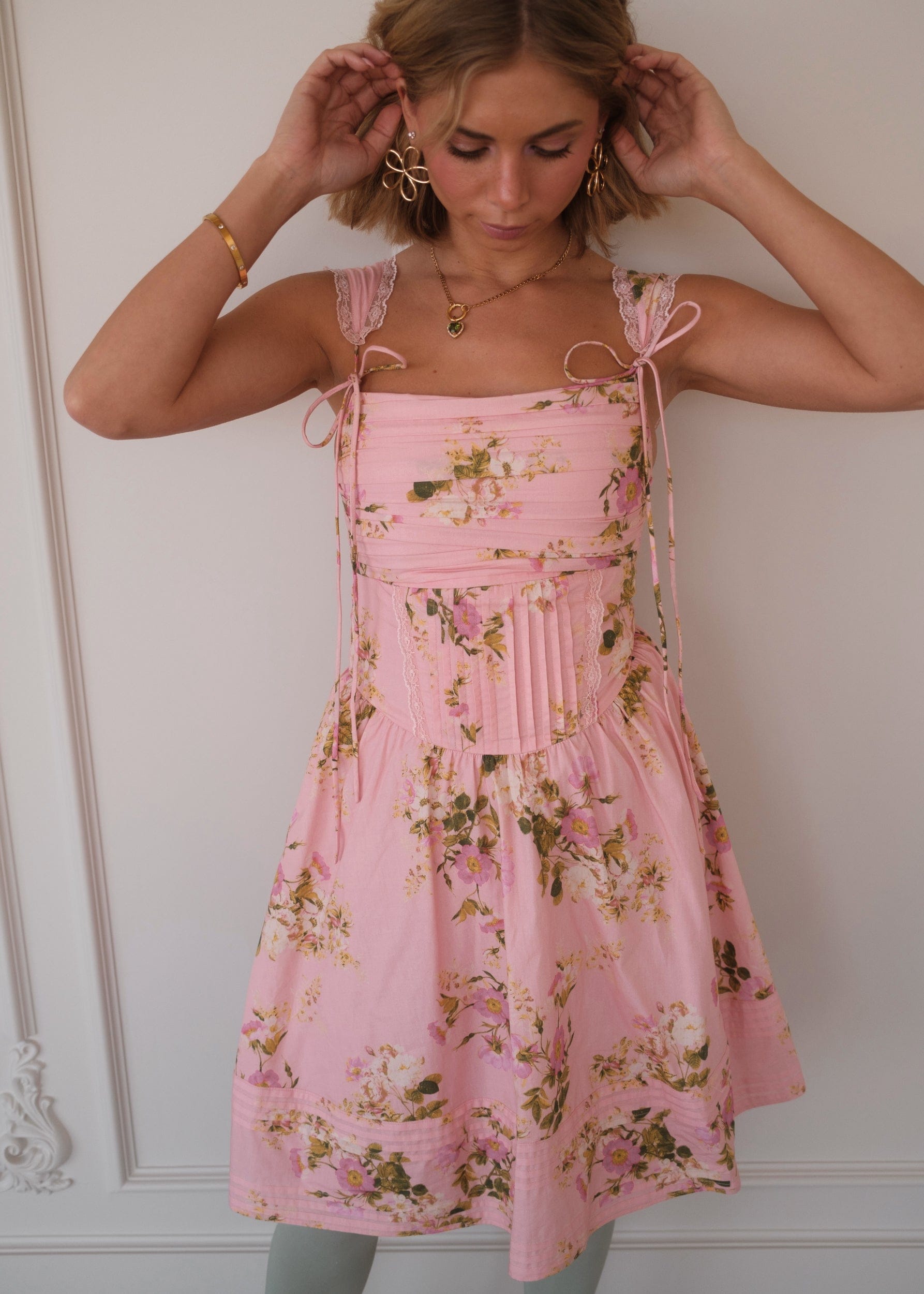 chic size inclusive model wearing JessaKae Rosella Dress - Pink