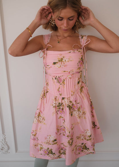 chic size inclusive model wearing JessaKae Rosella Dress - Pink